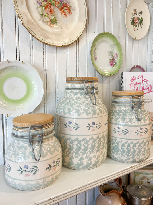 Vintage sage green spongeware ceramic canister set with wood lids styled for FOUND & Co. cottage kitchen decor
