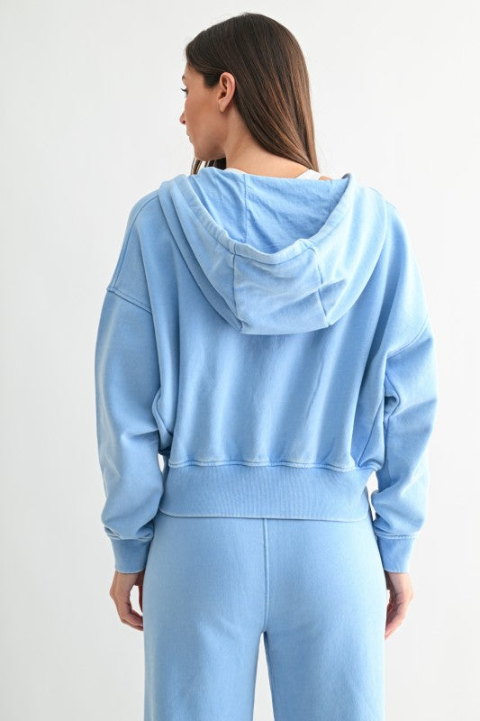 Back view of relaxed fit soft blue hoodie