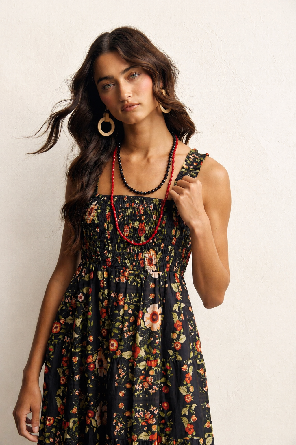 Close-up of the smocked bodice and ruffled straps on The Folk Tale floral maxi dress