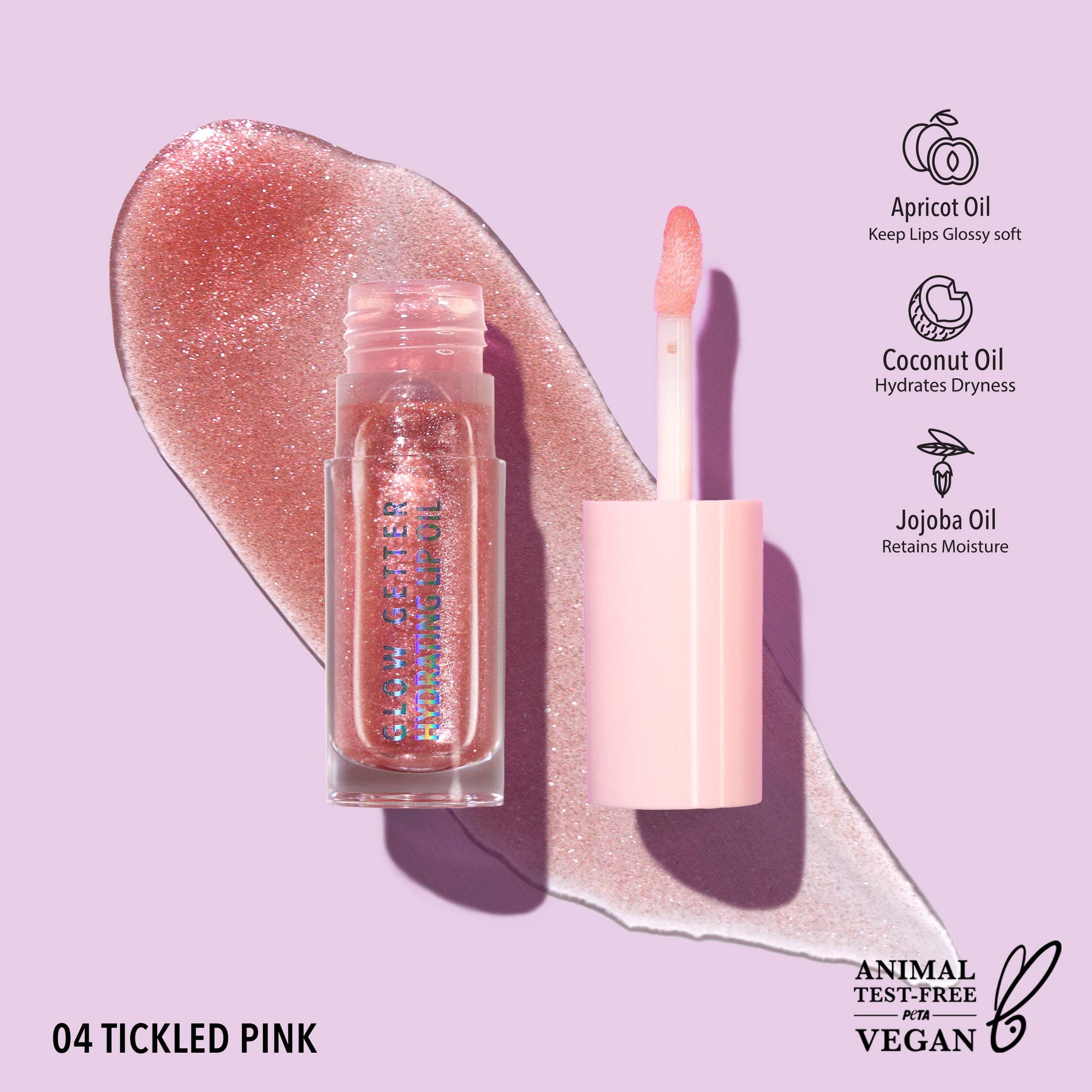 MOIRA Glow Getter Hydrating Lip Oil in Tickled Pink with sheer pink tint, subtle shimmer, and glass-like glossy finish in clear tube packaging.
