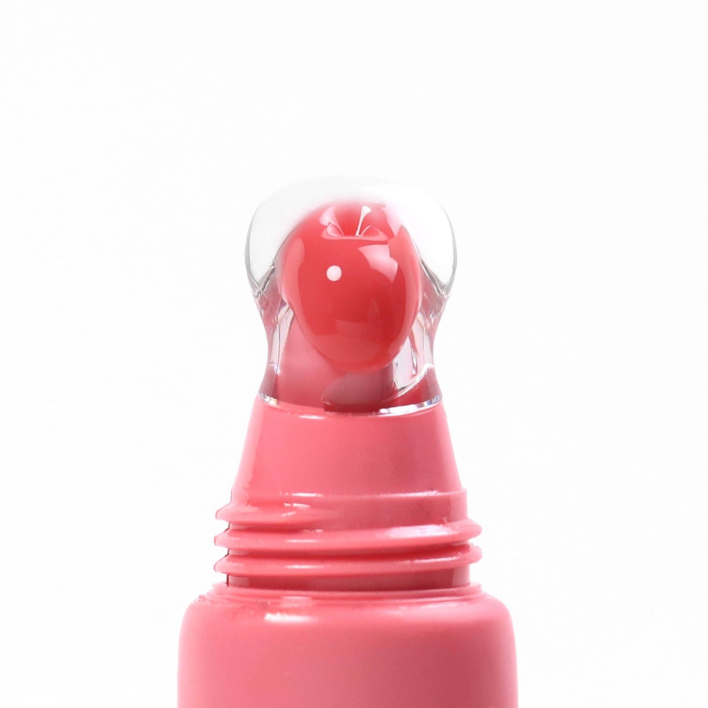 Pink lip gloss with a clear cap on a white background