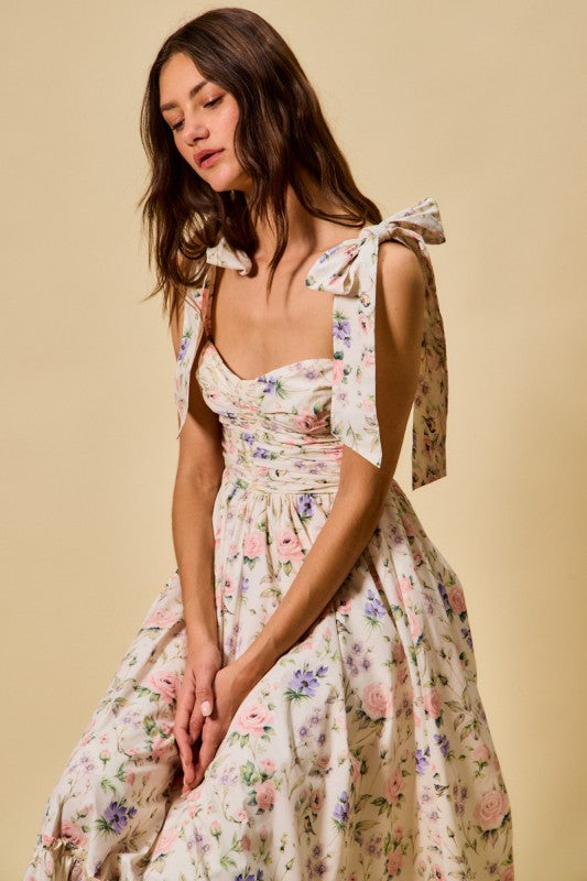 Floral cotton midi dress with ruched bodice and tie shoulder straps