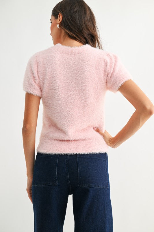 Blush fuzzy knit short sleeve top back view
