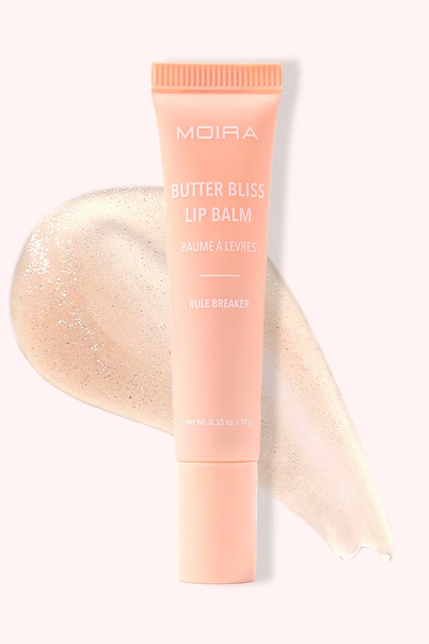 MOIRA Butter Bliss Lip Balm in Rule Breaker with glossy nude shimmer finish and hydrating vegan formula in squeeze tube packaging.