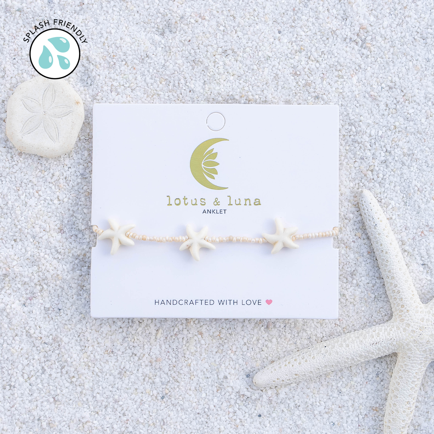 Starfish anklet on a 'lotus & luna' branded card with sand and starfish in the background