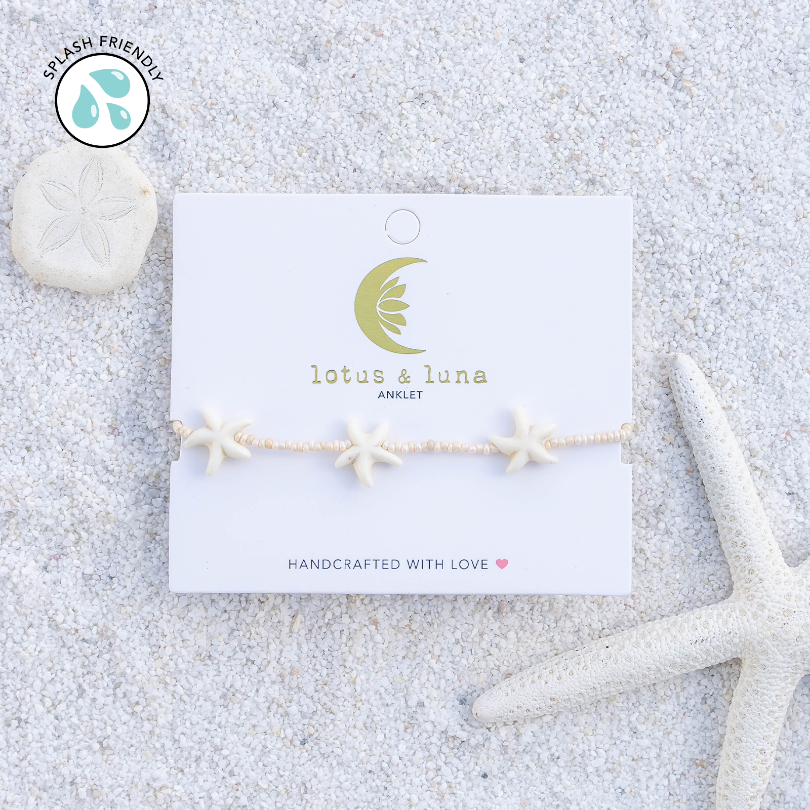 Starfish anklet on a 'lotus & luna' branded card with sand and starfish in the background