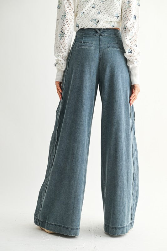 Back view of wide leg scalloped denim jeans with high waist and relaxed fit – boutique denim from The Rollin J Boutique