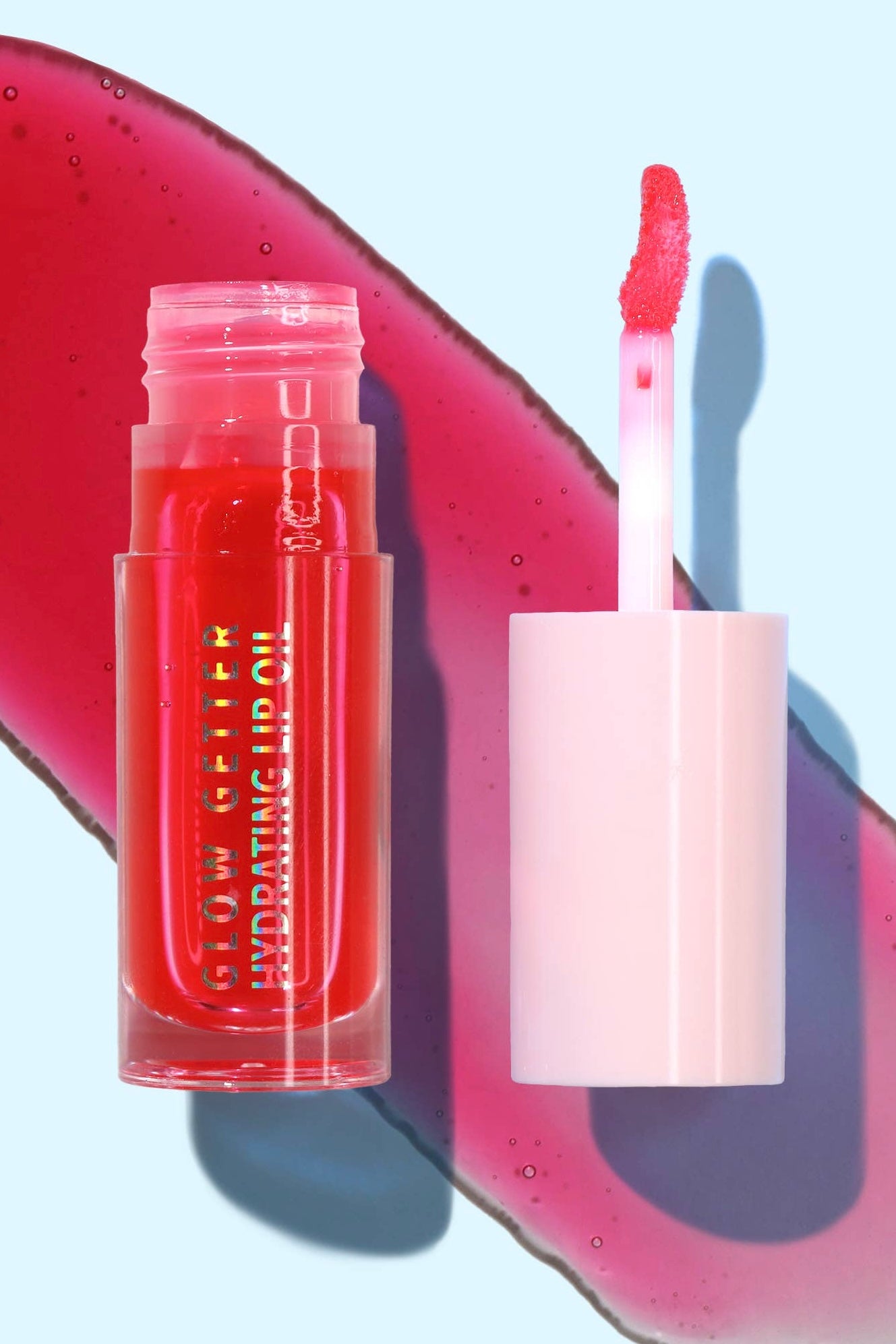 Lip balm and applicator with a colorful abstract background