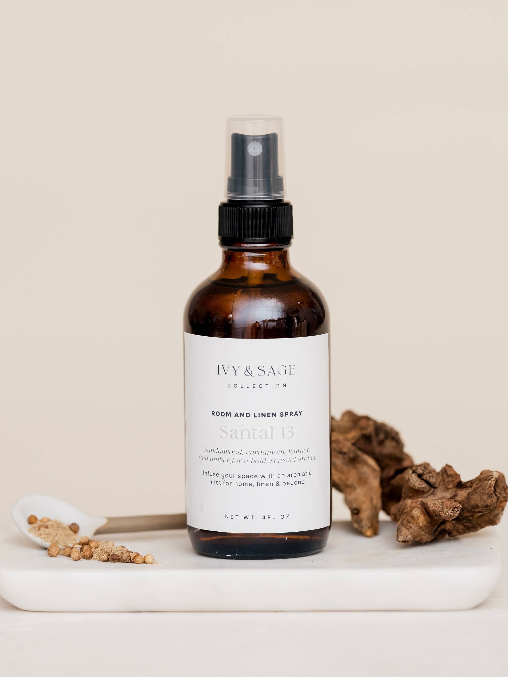 Brown spray bottle with label on a beige background