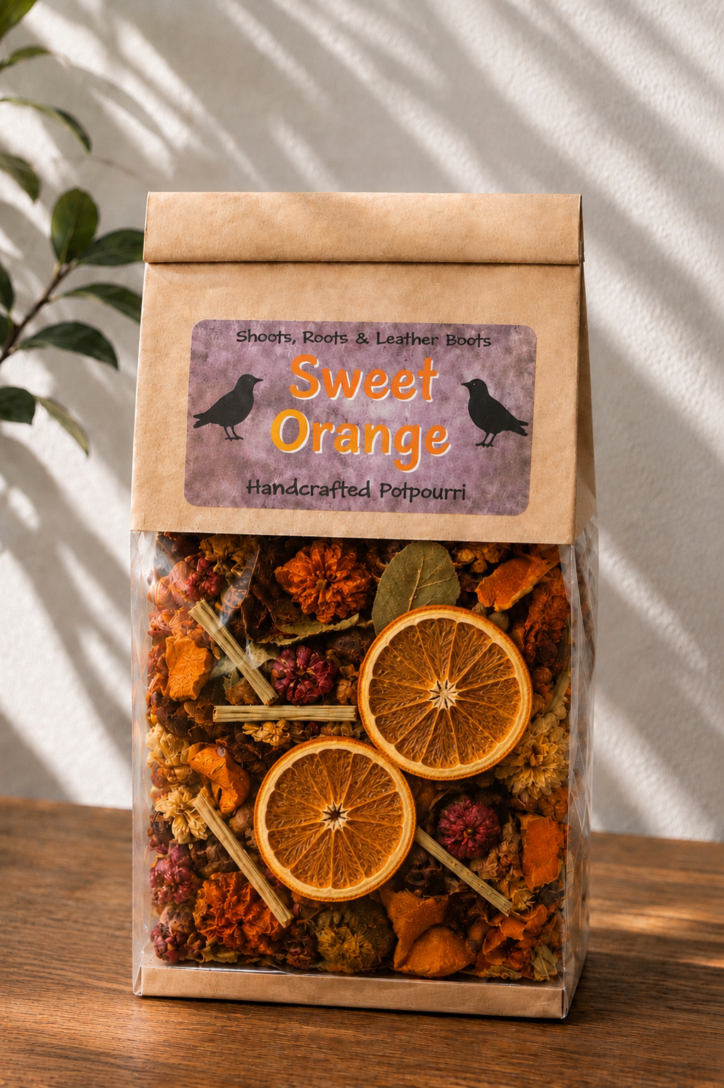     Sweet Orange handcrafted potpourri in a kraft bag with real dried orange slices and colorful botanicals