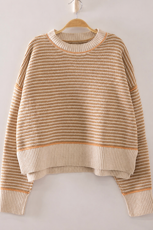 Front view of The Good Company Stripe Sweater in Toasted Oat with caramel micro stripes, apricot contrast stitching, and a wide ribbed hem.