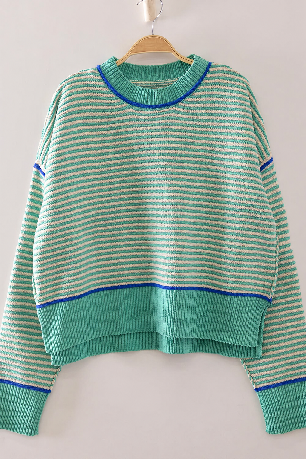 Front view of The Good Company Stripe Sweater in Sea Glass with aqua and cream micro stripes, cobalt trim, and a wide ribbed hem.