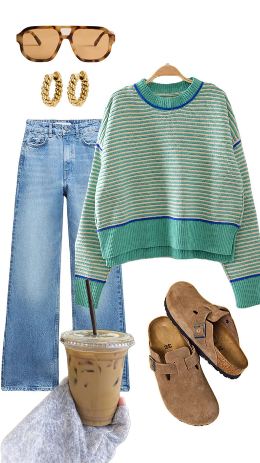 A flat-lay outfit collage on a white background featuring a green and white striped knit sweater, light blue jeans, tortoiseshell sunglasses, chunky gold hoop earrings, brown clogs, and an iced coffee held by a hand.