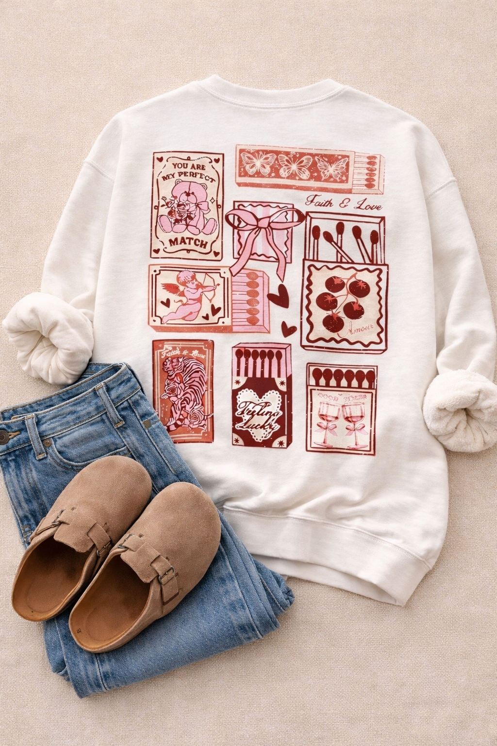 Back view of cream sweatshirt with vintage matchbook collage graphic