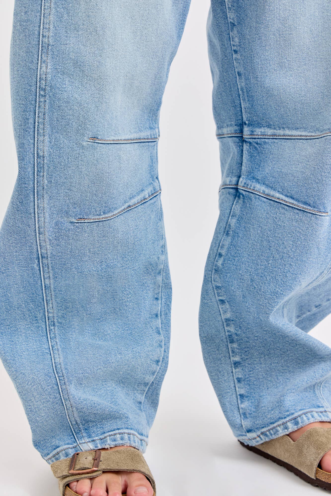 Light blue jeans on a white background