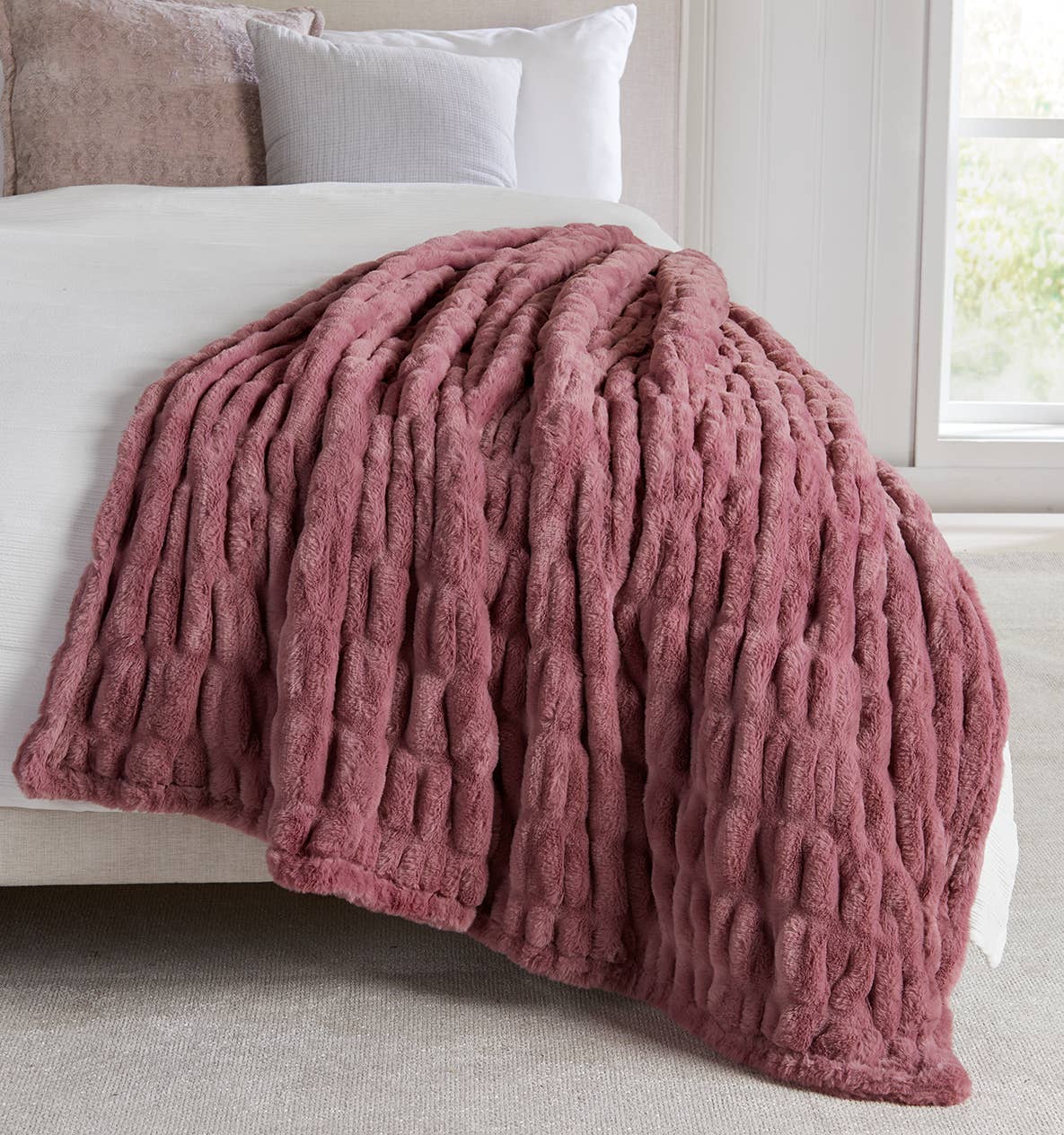 Ultra-soft faux-fur throw in a vintage rose tone. Sculpted texture, 50x60, perfect for gifting, home décor, or cozy winter cuddles.