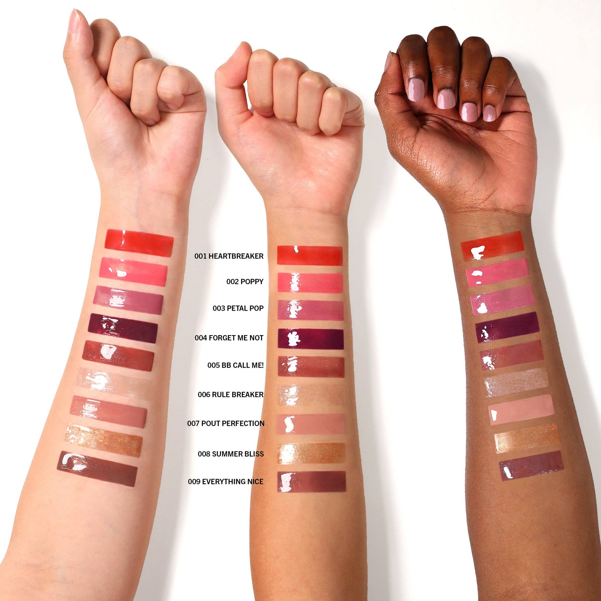 Three arms with various lip swatches on a white background