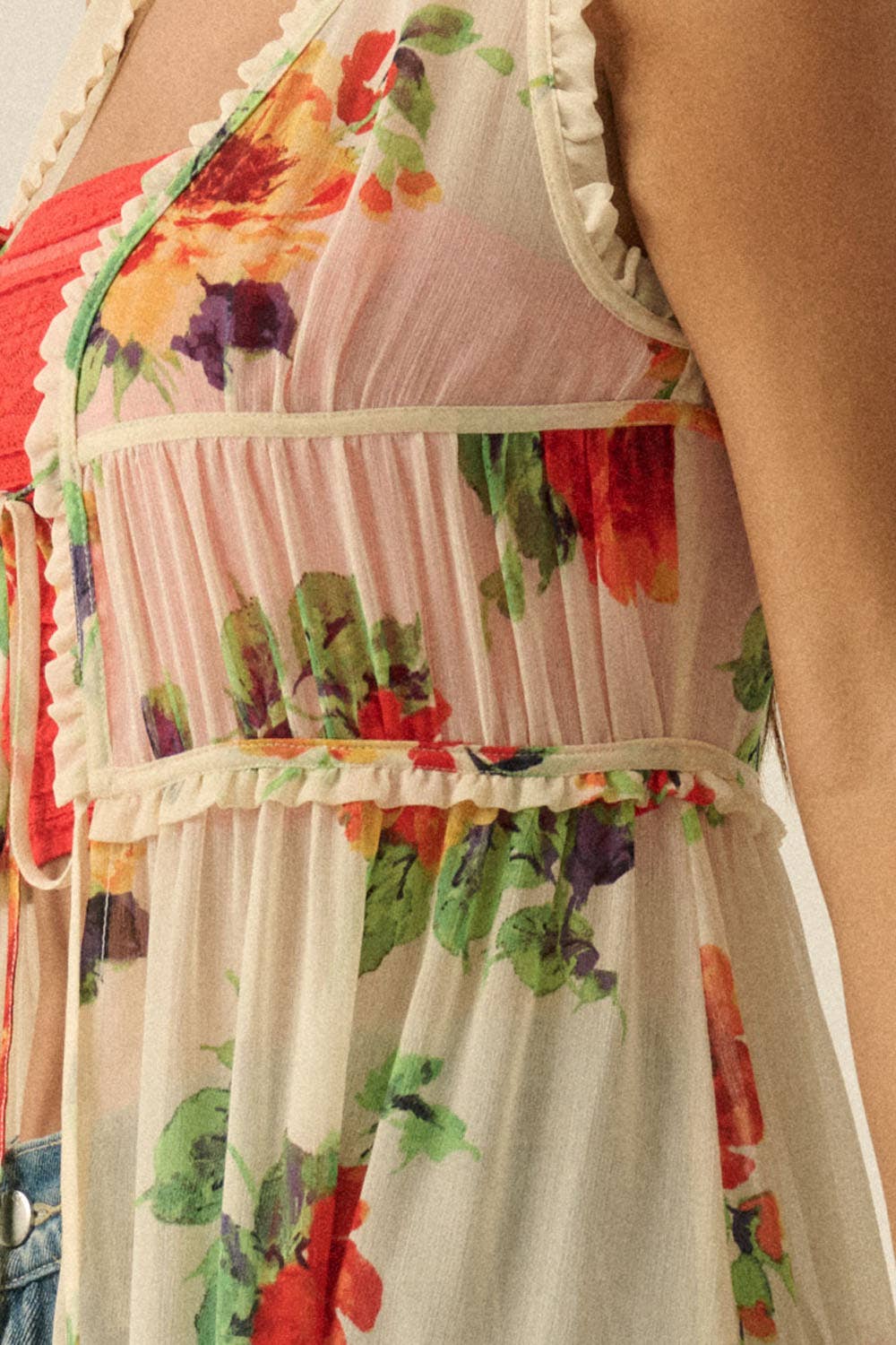 Close-up of a floral dress with colorful patterns on a blurred background