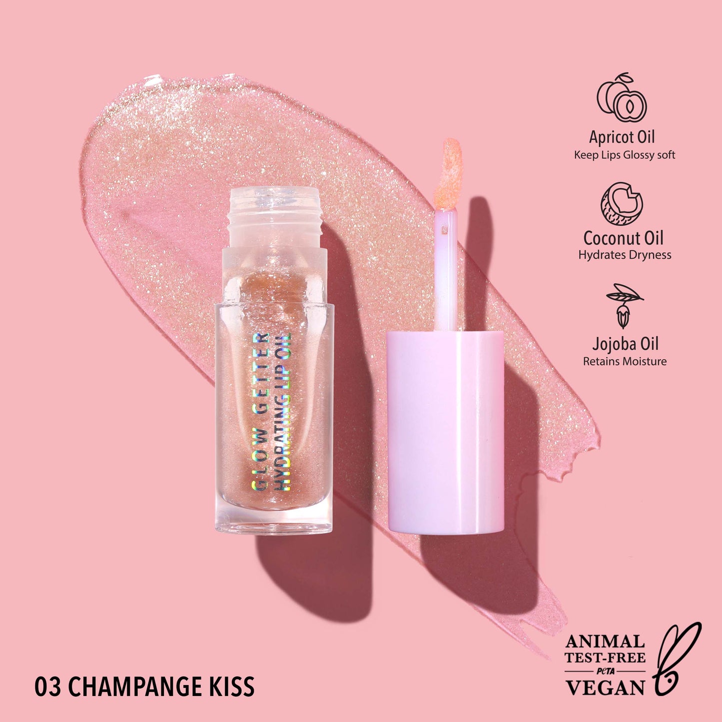 MOIRA Glow Getter Hydrating Lip Oil in Champagne Kiss with sheer champagne tint, golden shimmer, and glass-like glossy finish in clear tube packaging.
