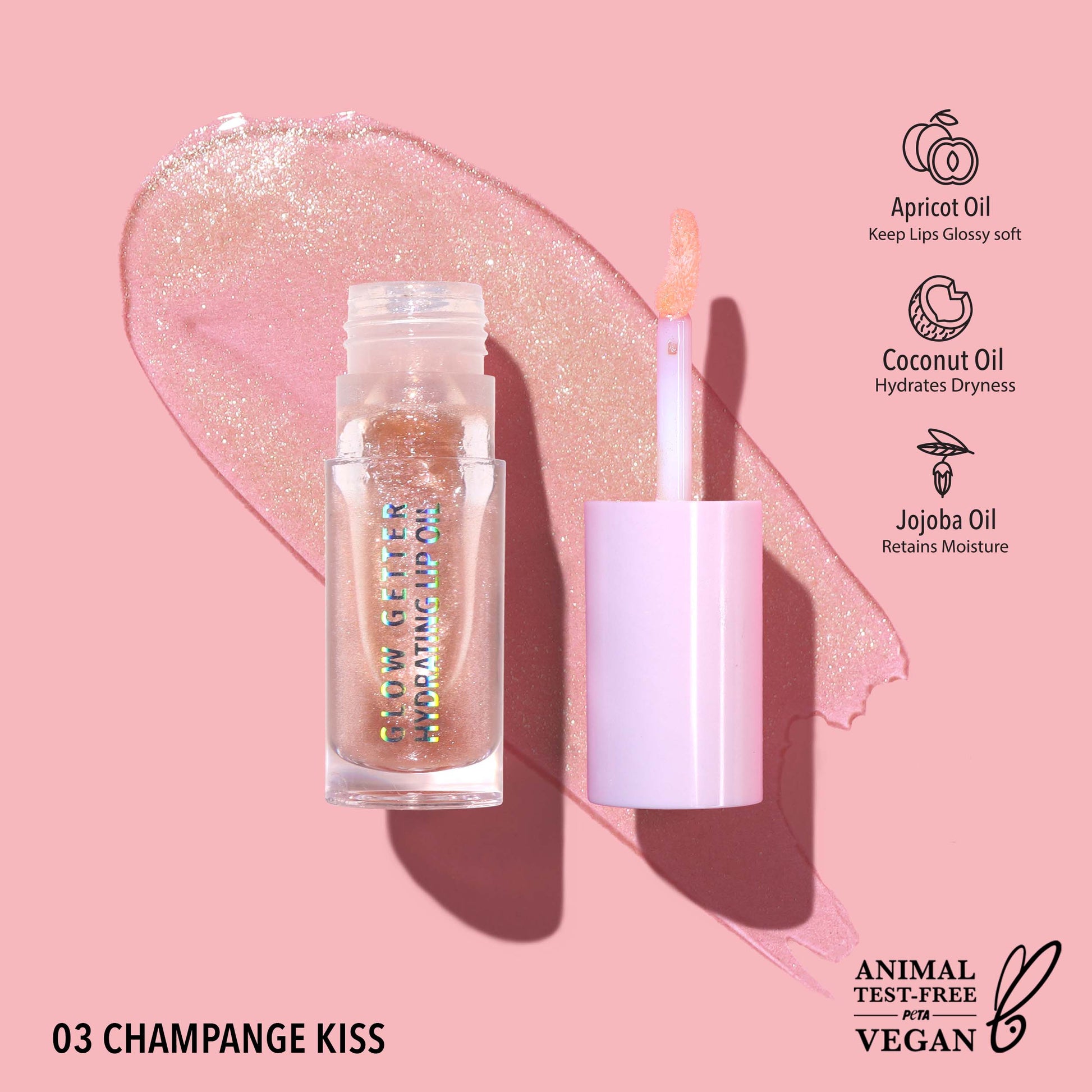MOIRA Glow Getter Hydrating Lip Oil in Champagne Kiss with sheer champagne tint, golden shimmer, and glass-like glossy finish in clear tube packaging.
