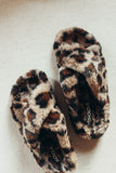Leopard fur slippers. 